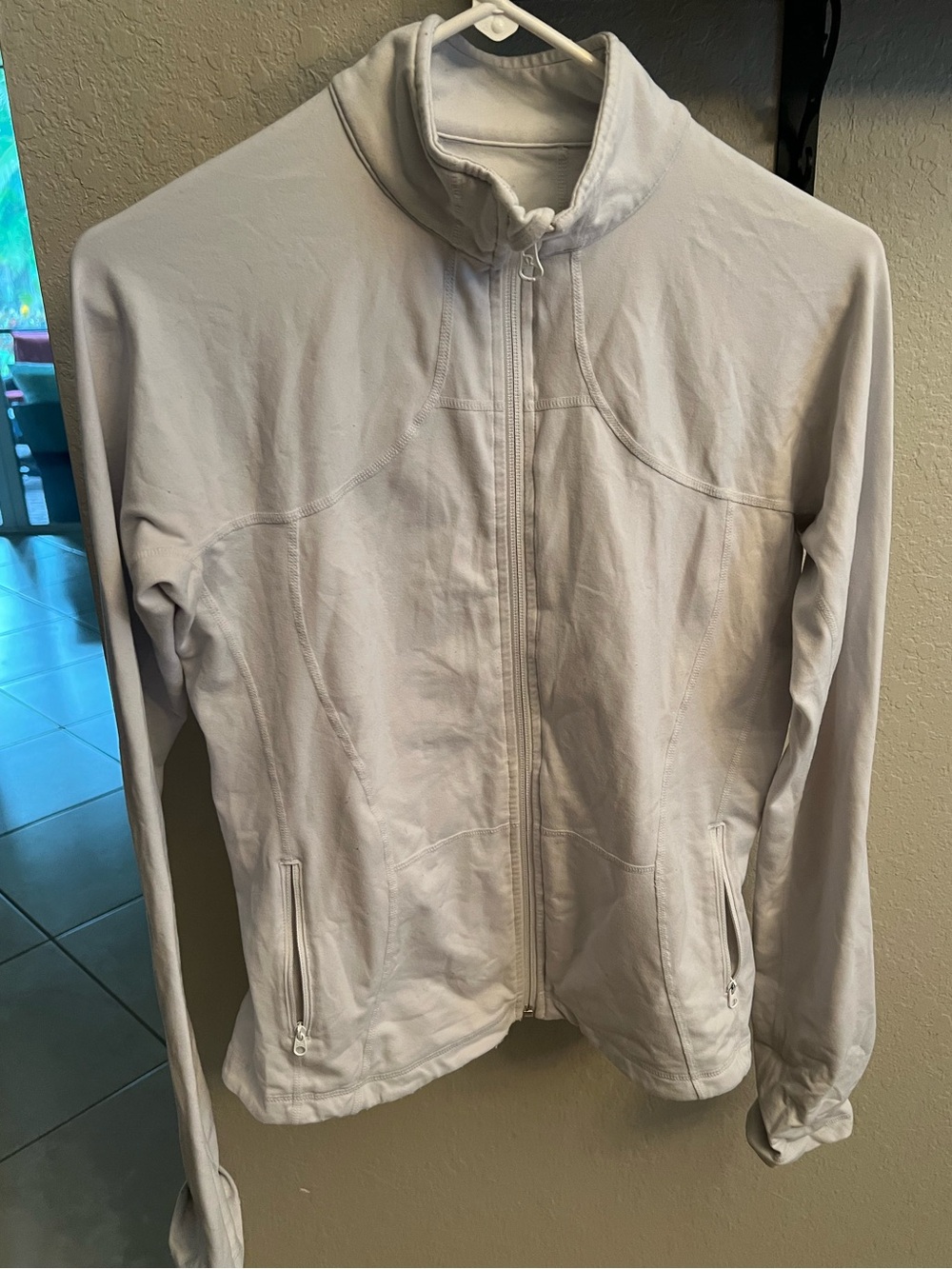 Lululemon Define Jacket- front sipper, tailored fit and contouring seams size S